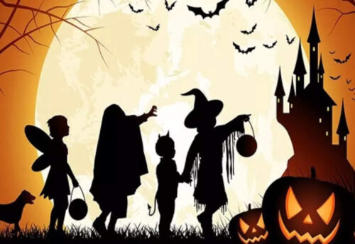 Halloween scene with silhouette of children trick or treating, and a spooky castle in the background.